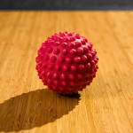 red spiky massage ball