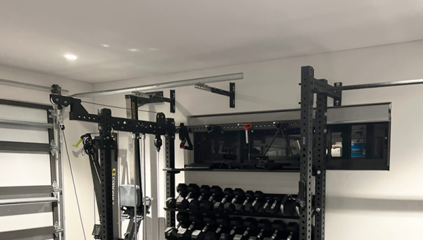 Customer Spotlight: Maximizing Garage Gym Space with a Custom Pulley & Storage Combo